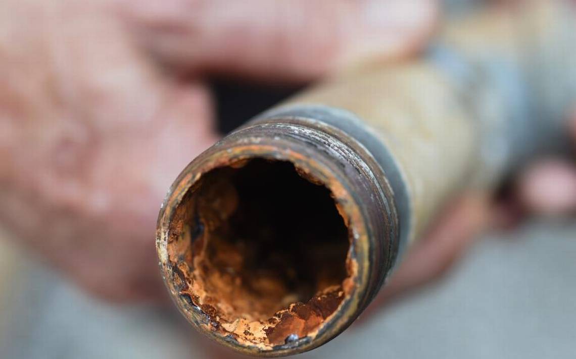 Sanitary pipe covered with rust